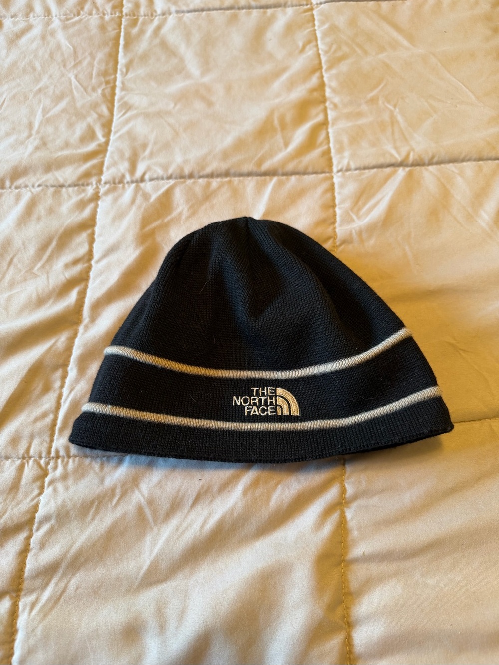 The North Face Black Wool Beanie with Contrasting White Stripes